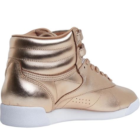 gold high top reebok classics.